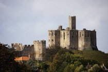 Warkworth Castle on top of hill — Stock Photo