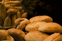 Stacks of fresh bread baguettes, closeup — Stock Photo