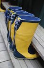 Two Pairs Of Yellow Boots — Stock Photo