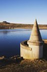 Water reservoir with hilly coast — Stock Photo