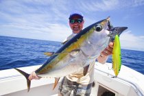 Man holding just caught yellowfin fish. panama — Stock Photo