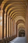 Old arched colonnades — Stock Photo