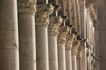 Tops of a row of columns — Stock Photo