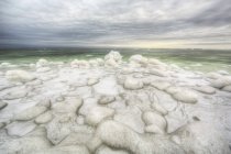 Green ice filled water of hudson's bay — Stock Photo