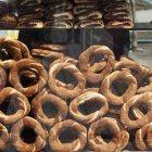 Ring shaped bread on display at street market — Stock Photo