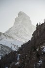 Tall snow covered peak of matterhorn — Stock Photo