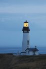 Санрайз-At Yaquina Head Lighthouse — стоковое фото