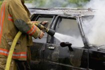 Car Fire With Hose — Stock Photo