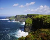 Cliffs Of Moher against water — Stock Photo