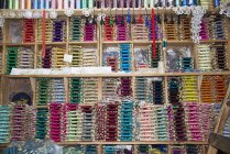 Attractive display of threads in local store, Chefchaouen, Morocco — Stock Photo