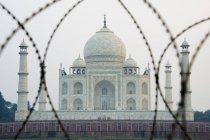Taj Mahal through barbed wire — Stock Photo