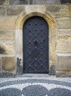 Arched metal door — Stock Photo