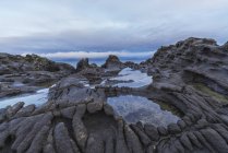Вулканическая основа с водой — стоковое фото