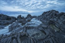 The volcanic bedrock near Tow Hill at dawn — Stock Photo
