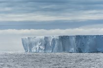 Tabular iceberg in water — Stock Photo