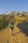 Hiker On Mountain Trail — Stock Photo
