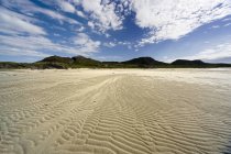 Rippled Beach with hills — Stock Photo