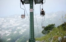 Woman Riding Chairlift — Stock Photo