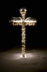 Beleuchtetes Kreuz am Boden — Stockfoto