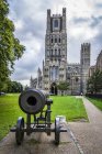 Russian canon captured during the Crimean War in front of Ely Cathedral; Ely, Cambridgeshire, England — Stock Photo