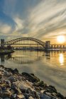 Hell Gate And Rfk Triboro Bridges At Sunset, Ralph Demarco Park; Queens, New York, United States Of America — Stock Photo