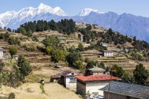 Valley landscape view in the Nepalese Himalayas with a Buddhist temple; Nepal — Stock Photo