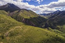 The mountains of the Tombstone Range in northern Yukon, Dempster Highway; Yukon Territory, Canada — Stock Photo