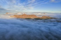 Aerial view of the West Fjords from above the clouds; Djupavik, West Fjords, Iceland — Stock Photo