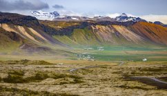 Beautiful long view across the colourful landscape of a valley from a tourist lookout, Iceland — Stock Photo