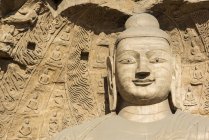 Geschnitzte buddhistische Statuen an Yungang-Grotten, uralte buddhistische Tempelgrotten in der Nähe von Datong; China — Stockfoto