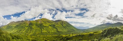 Panorama of the Little Susitna Valley, Palmer in the background, bright clouds in the sky, Hatcher Pass, South-central Alaska; Palmer, Alaska, United States of America — Stock Photo