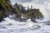 Cape Disappointment with a lighthouse up on the ridge, Ilwaco, Washington, United States of America — стокове фото