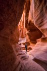Man standing in a Slot Canyon known as Canyon X, near Page; Arizona, United States of America — Stock Photo