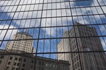 Reflection of buildings on glass window, Berkeley Building, 500 Boylston Street, John Hancock Tower, Boston, Suffolk County, Massachusetts, USA — Stock Photo