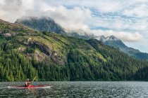 Kayaker paddling in Prince William Sound; Alaska, United States of America — Stock Photo