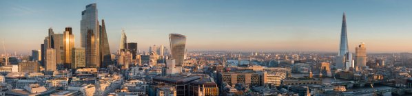 Panoramic cityscape and skyline of London with The Shard, 20 Fenchurch and various other skyscrapers at dusk; London, England — Stock Photo
