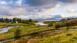 Thingvellir a historic site and national park. Thingvellir Church and the ruins of old stone shelters. — Stock Photo