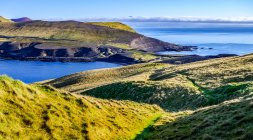 La isla de Heimaey en el archipiélago de Vestmannaeyjar; Heimaey, Vestmannaeyjar, Región Sur, Islandia - foto de stock