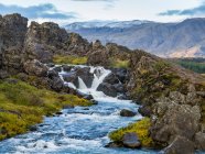 Thingvellir historic site and national park. On the site are the Thingvellir Church and the ruins of old stone shelters. The park sits in a rift valle — Stock Photo
