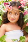 Portrait Of A Young Girl With Tropical Flowers In Her Hair; Honolulu, Hawaii, United States Of America — Stock Photo