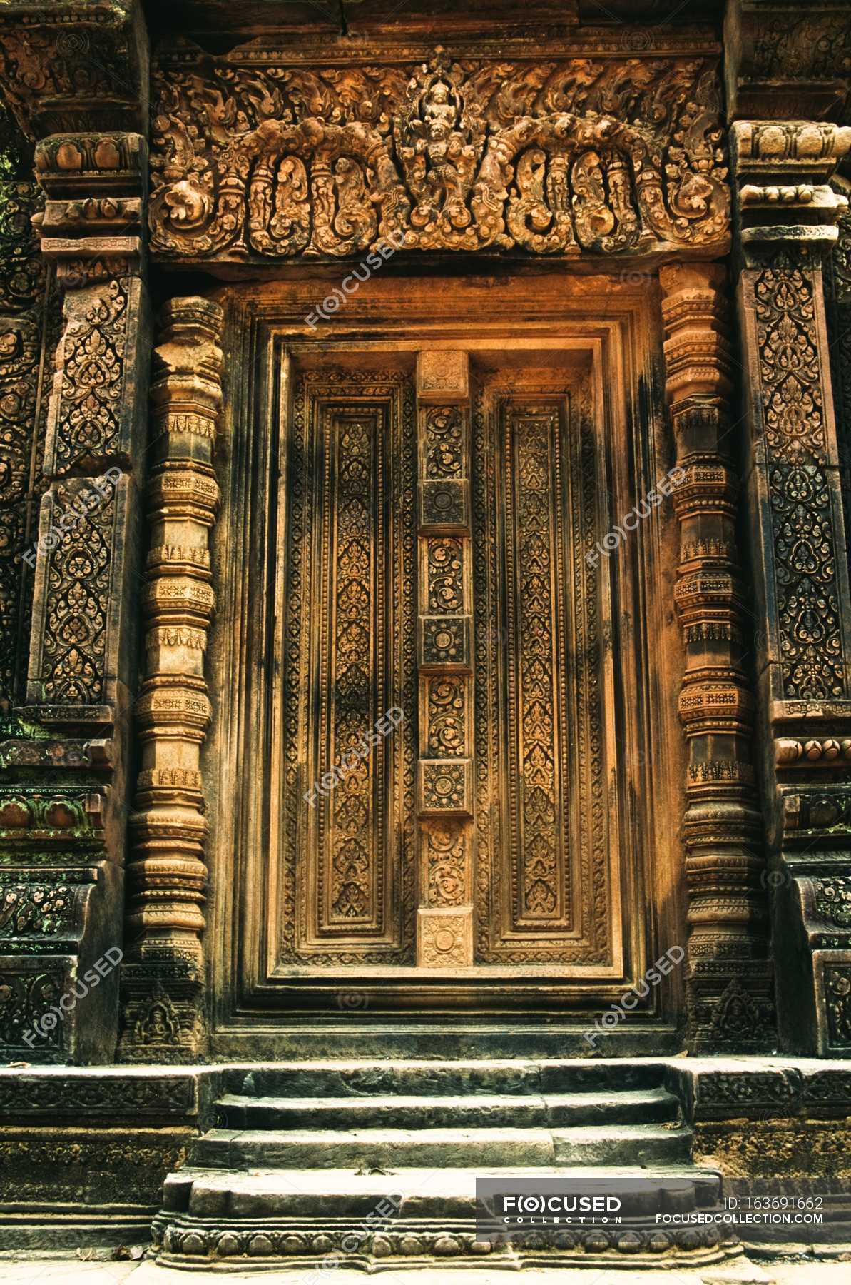 Doorway with decorative door — freshness, daytime - Stock Photo ...