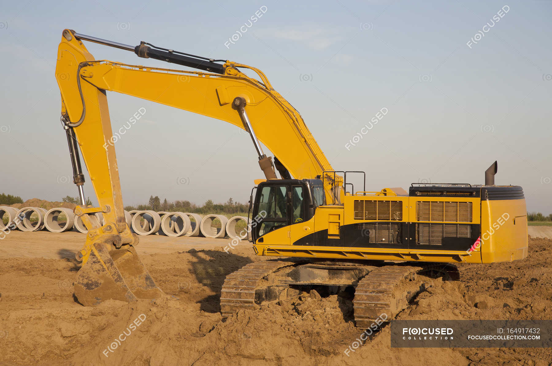 Backhoe Digging For Sewer Installation — scene, production - Stock ...