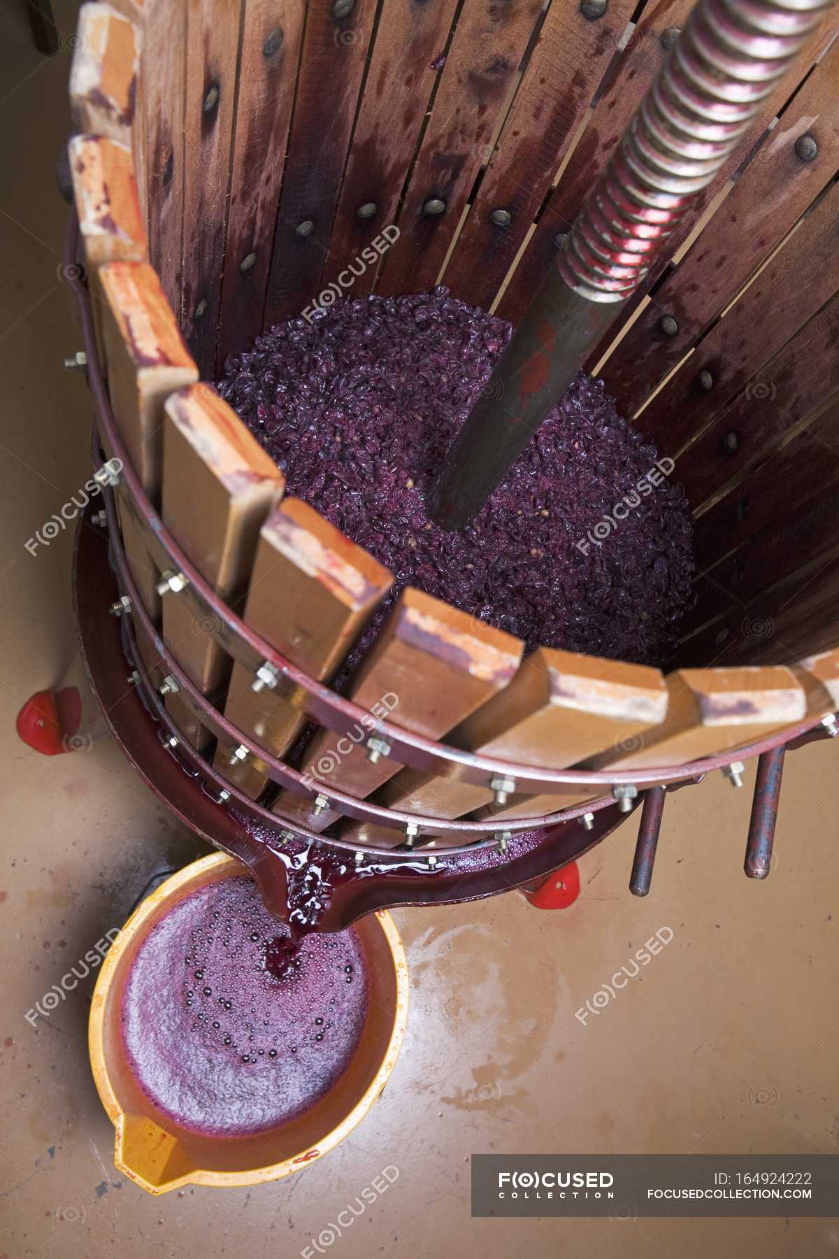 Grape Press With Red Grape Juice Pouring Views Stock Photo   Focused 164924222 Stock Photo Grape Press With Red Grape 