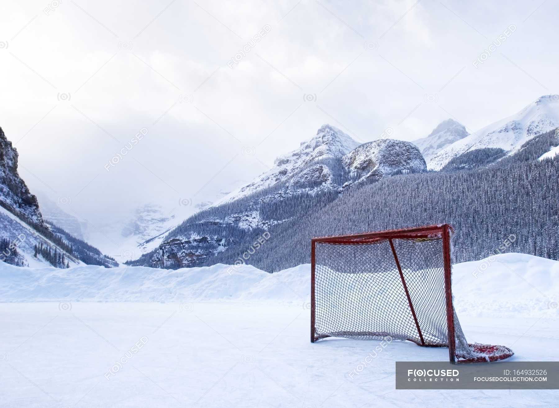 Hockey Goal On Frozen Lake — snow covered, copy space - Stock Photo ...