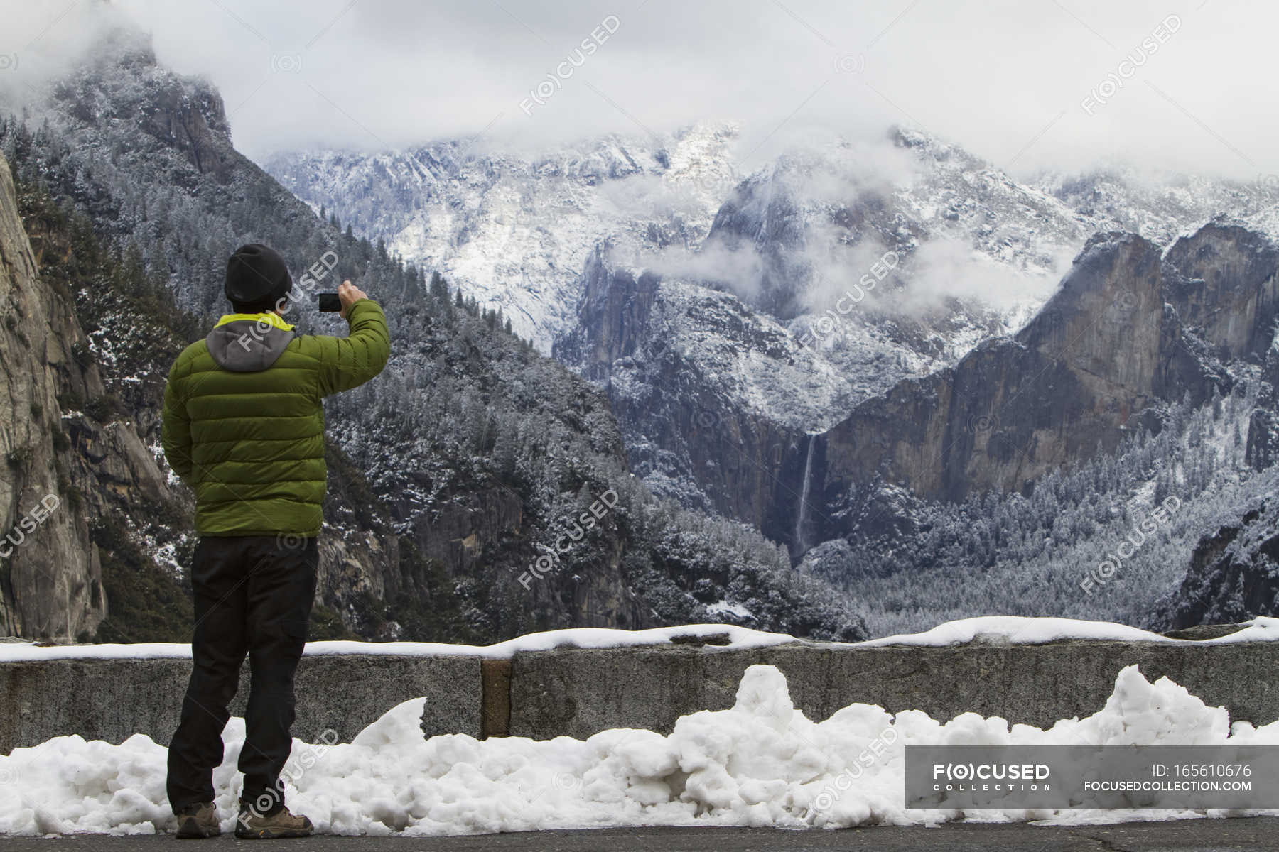 Man wearing down jacket — season, beauty Stock Photo 165610676