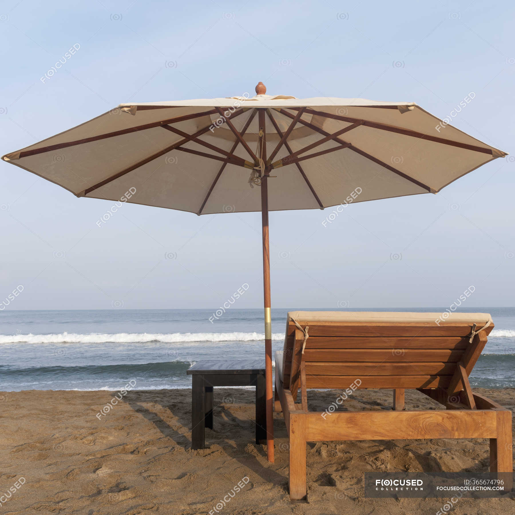 Lounge Chair And Umbrella On Beach — seats, white Stock Photo 165674796