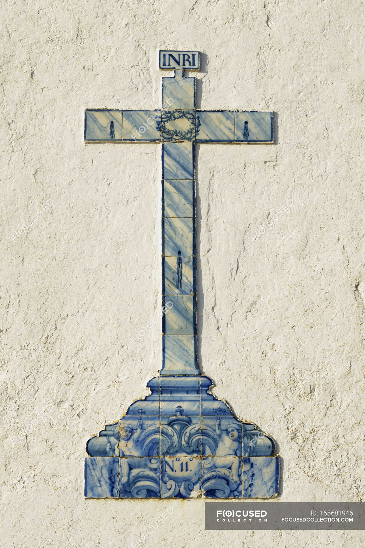 Blue Cross On White Wall — christianity, history - Stock Photo | #165681946