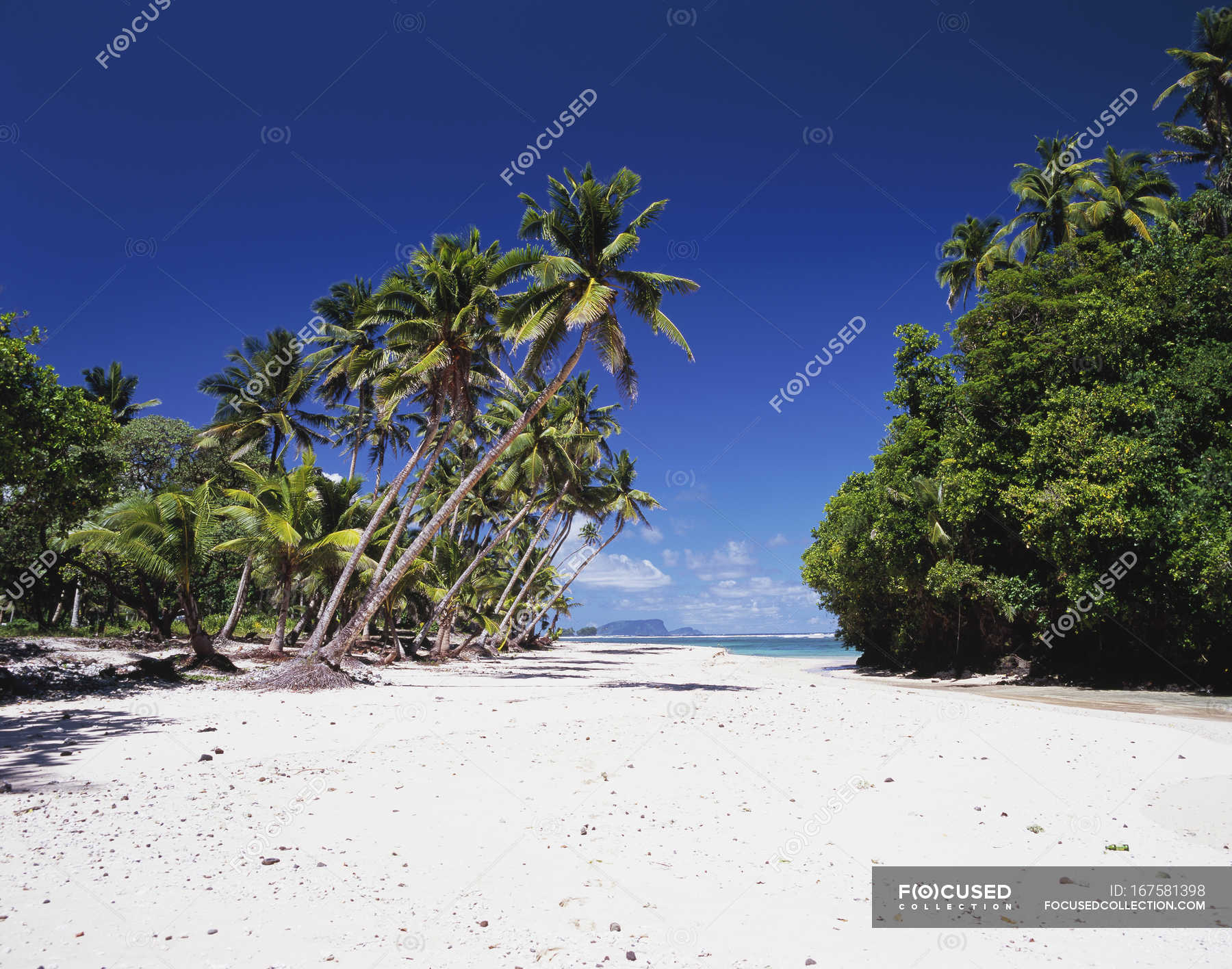 Tranquil scene of Vavau Beach — daylight, blue sky - Stock Photo ...