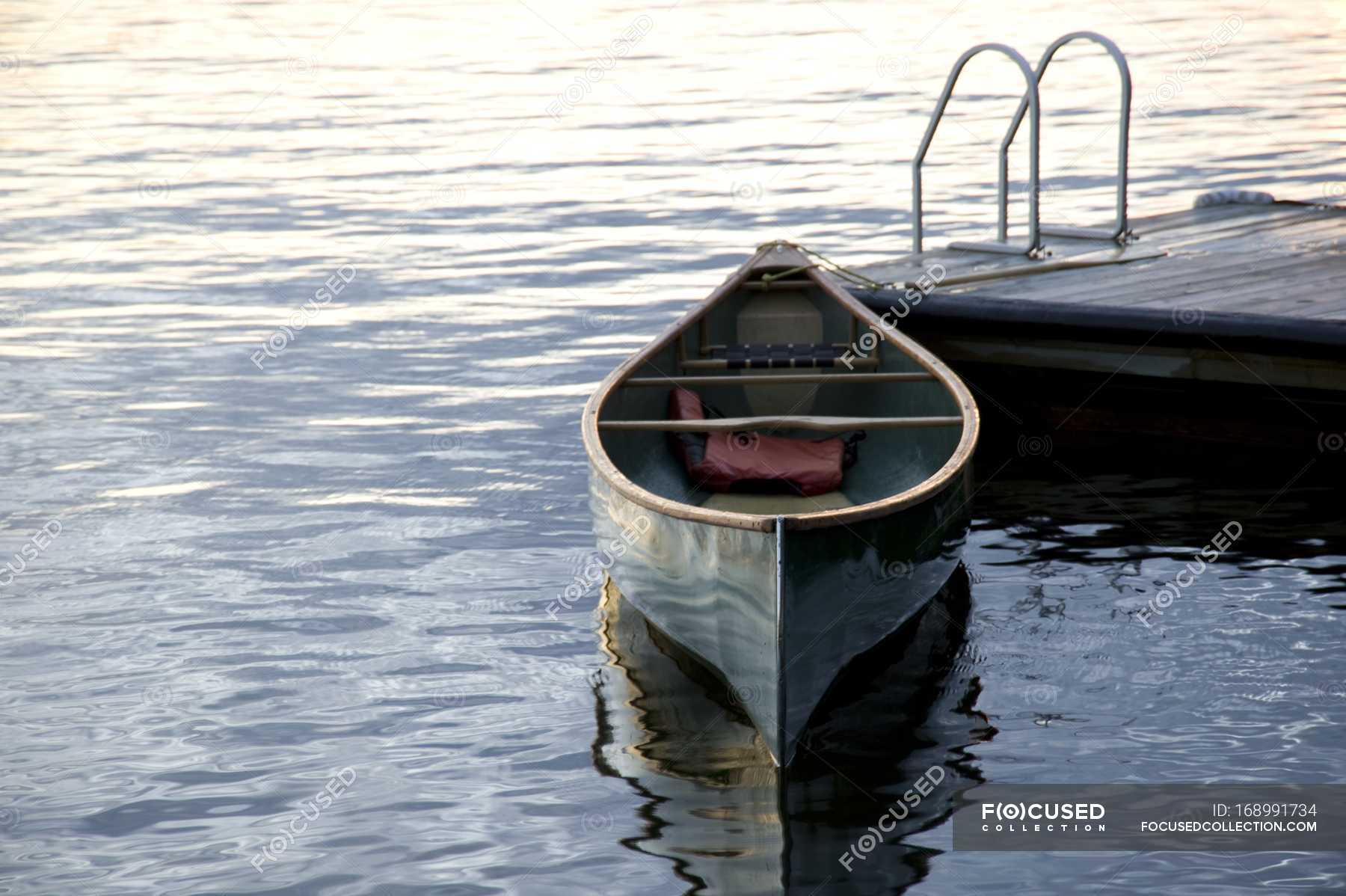 Canoe Moored At Dock — Fresh, Scenic - Stock Photo 