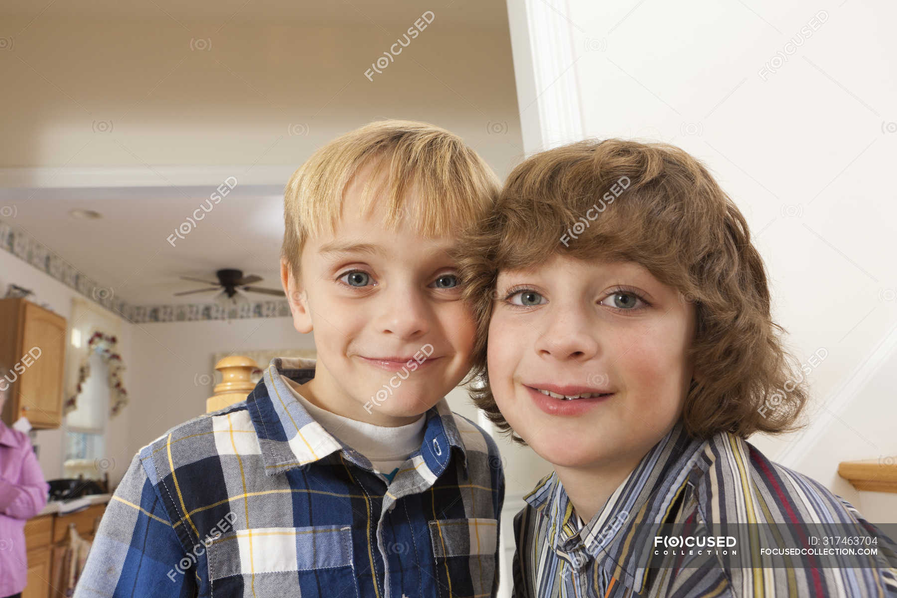 Portrait of two brothers at home together — horizontal, family - Stock ...